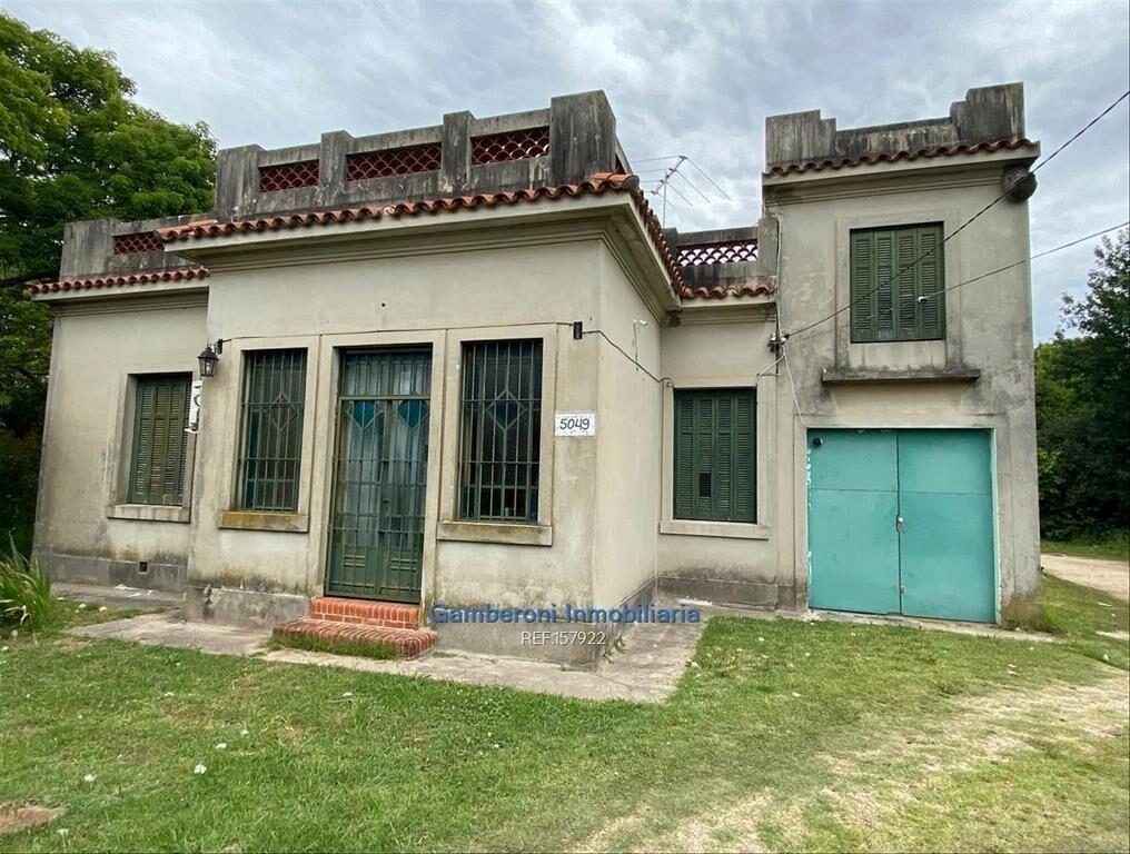 Terreno con construcciones en zona logística
