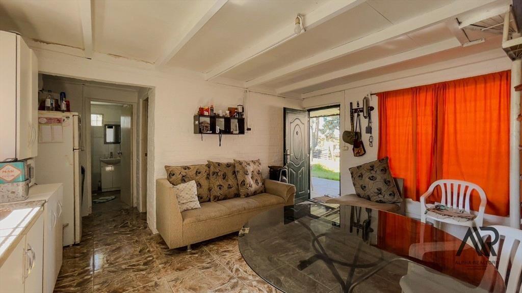 Venta Terreno mas 3 propiedades c/ cochera en Bello Hori...