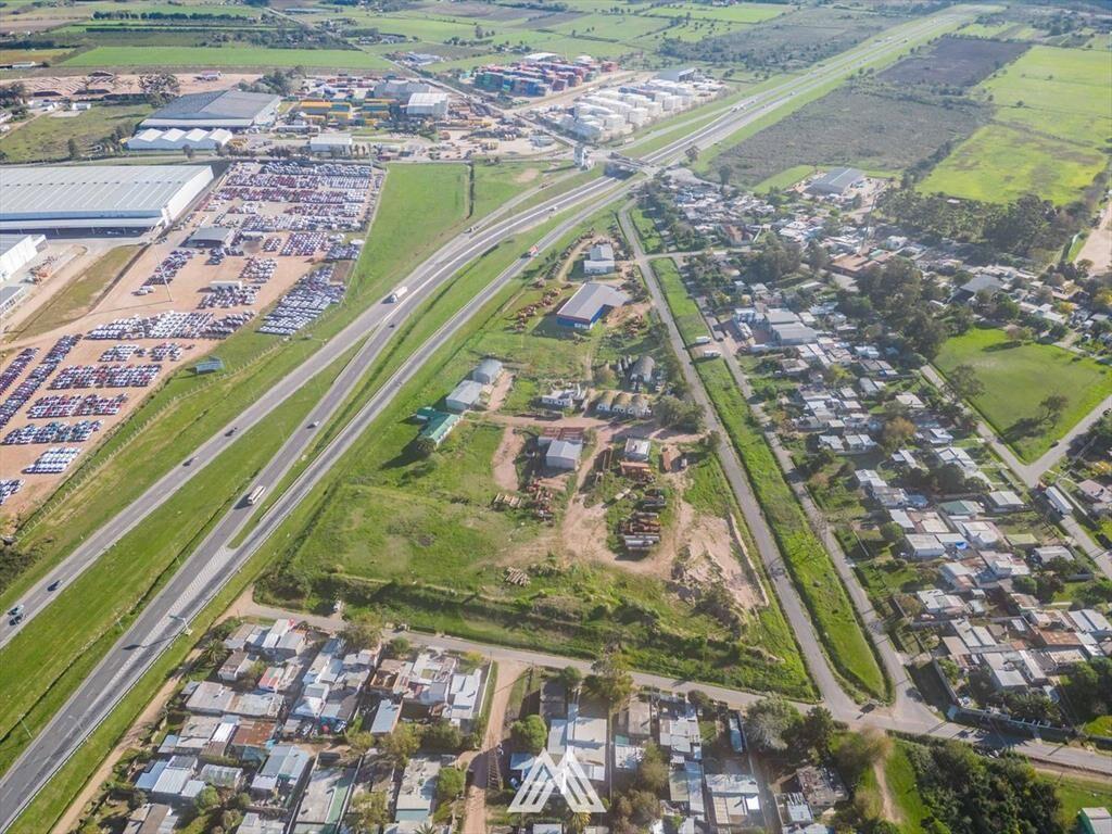 VENTA DE TERRENO CON DEPÓSITOS-OFICINAS RUTA 1