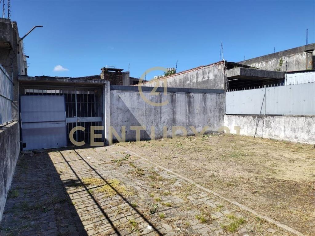 Terreno FRENTE, av CENTENARIO pasos PROPIOS ,Permuta!