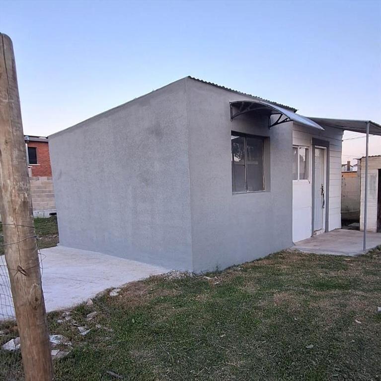 Alquiler casa 1 dormitorio y cochera en Pando