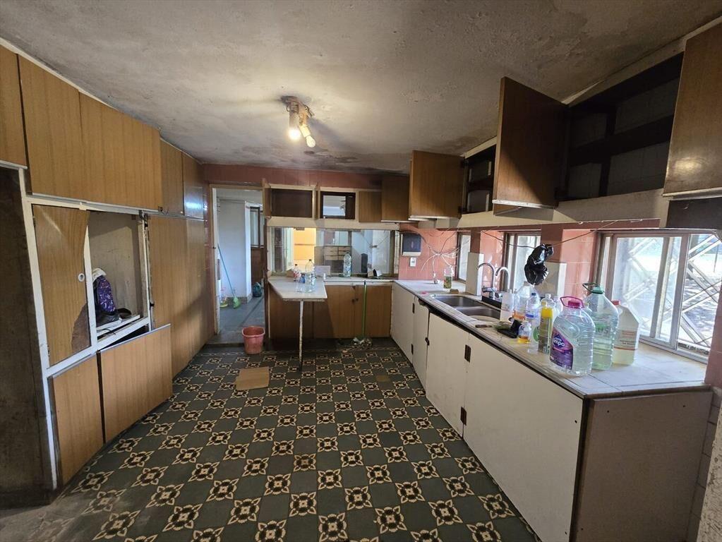 Gran Casona con excelente terreno sobre Av. Garzon, próx Sh