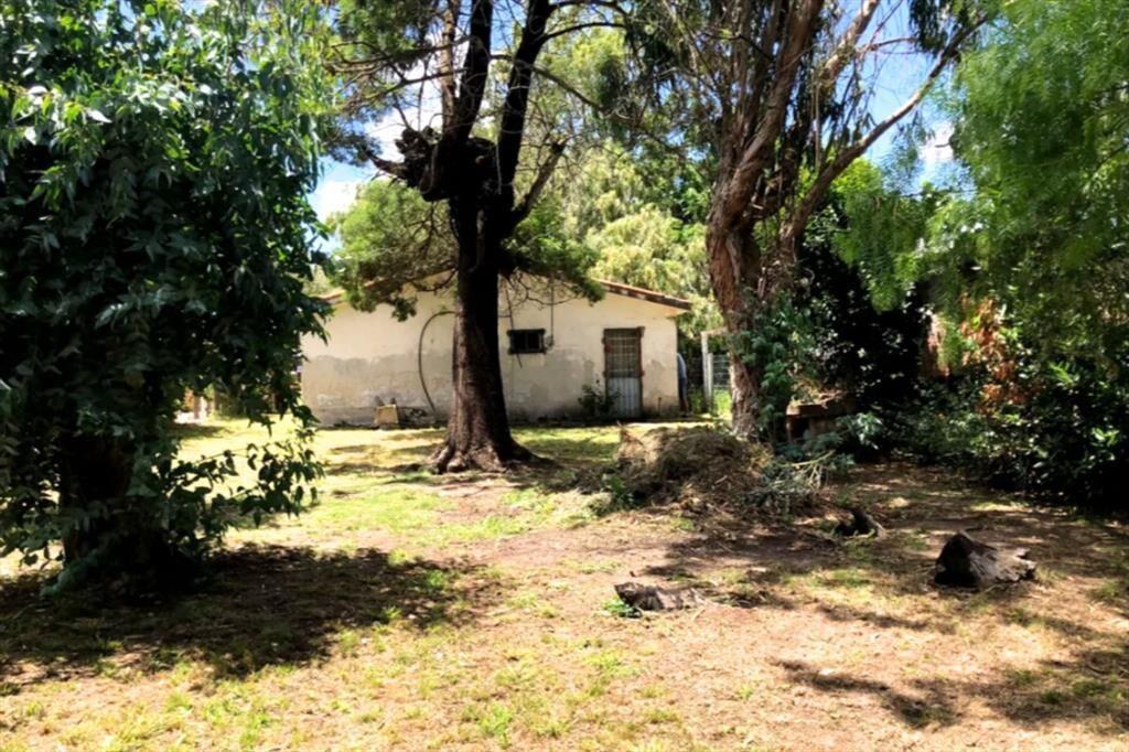 Venta terreno con mejoras en San Luis