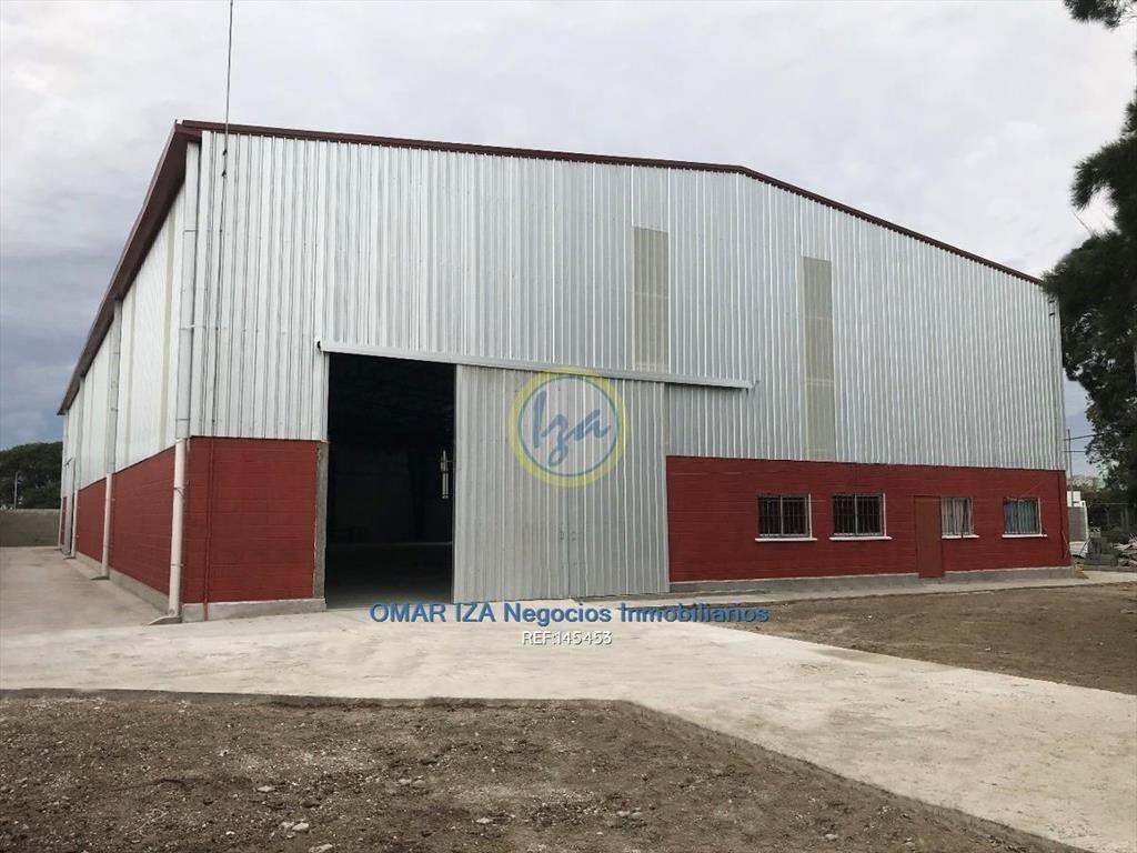 Venta local industrial con renta deposito malvin norte
