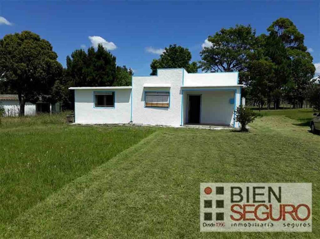 Chacra de 2,7 hás. con 2 casas y un apartamento en venta en