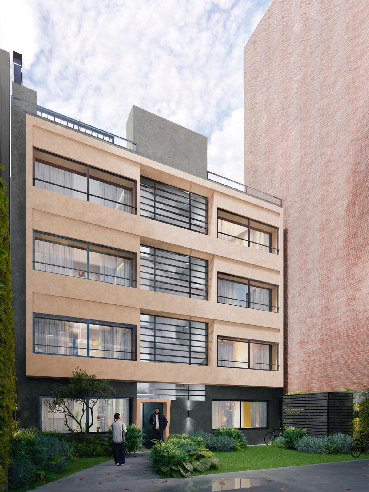 # Modern Multi-Family Residential Building
This is an exterior view of a contemporary 4-story residential building featuring a striking mixed-material facade with warm beige/tan stucco upper levels and a dark charcoal ground floor. The property showcases clean architectural lines with horizontal metal railings, large windows with integrated blinds, and a modern minimalist design aesthetic. The ground level includes landscaped green space with native plantings, a welcoming entry courtyard, and bicycle storage, while the upper floors appear to contain multiple residential units with private balconies and ample natural light.